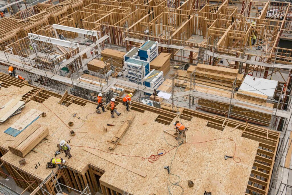 construction site multiple crews wide angle american