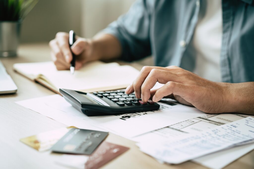 Car accident insurance claim paperwork and calculator